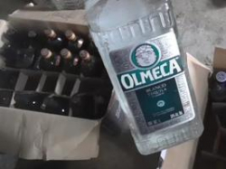 В гаражах под Волгоградом нашли склад поддельного виски и текилы